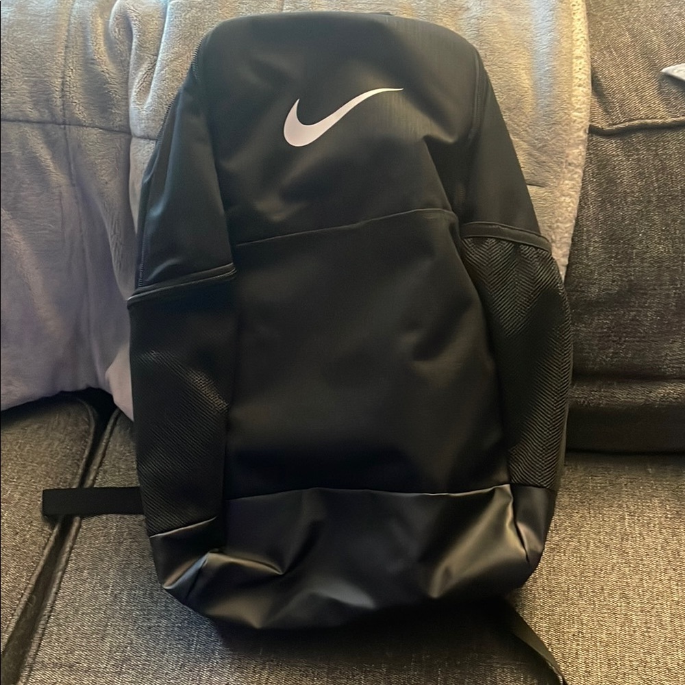 Nike Black Athletic Backpack with Iconic Swoosh